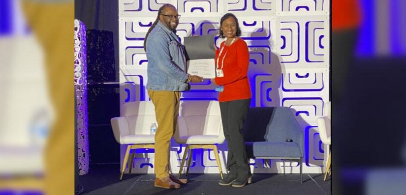 An award presentation on stage