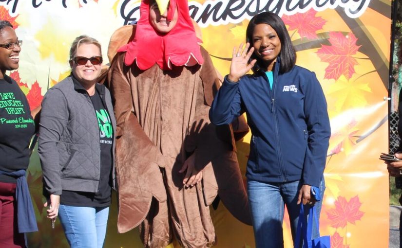 Event partners and volunteers at a community Thanksgiving event